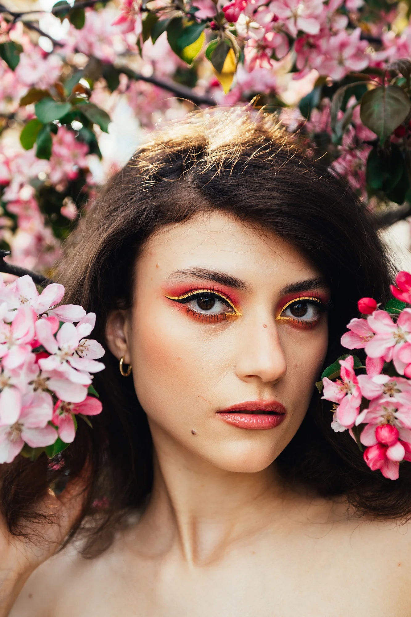 AI Preset Lab Magic AI Kodak UltraMax 400 Lightroom Film Preset applied to a fashion portrait of a model surrounded by flowers.